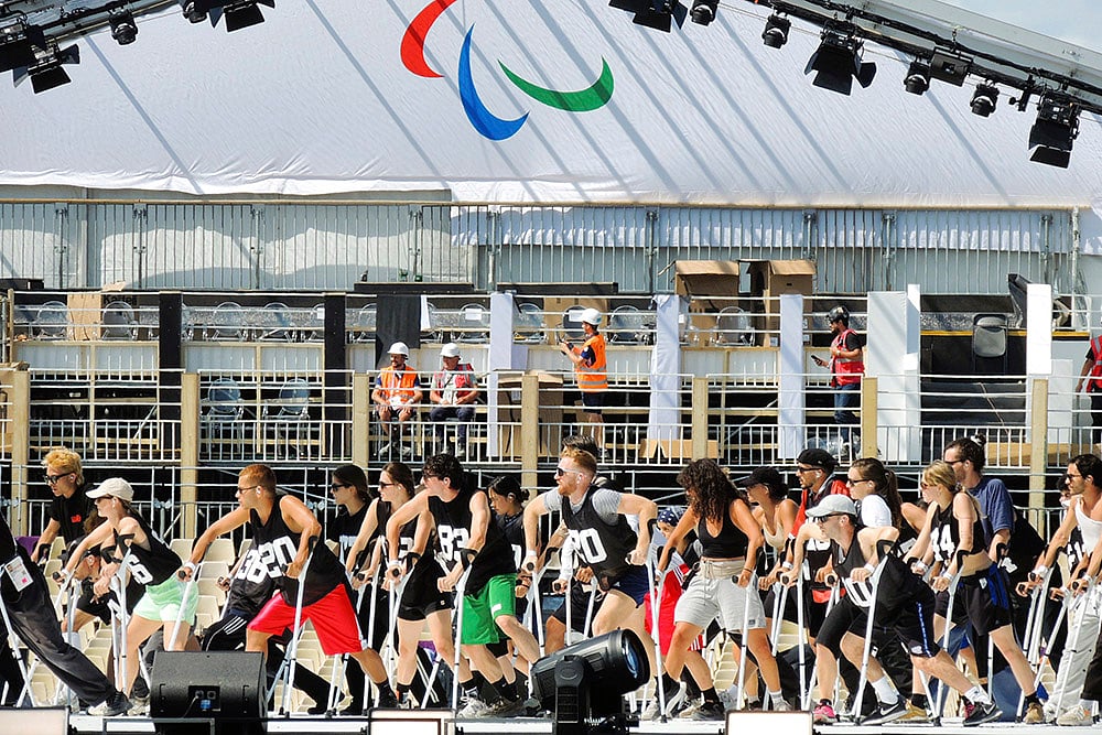 | Photo: AP/Tom Nouvian : Paris 2024 Paralympic Games: A group of dancers use crutches during the rehearsal 